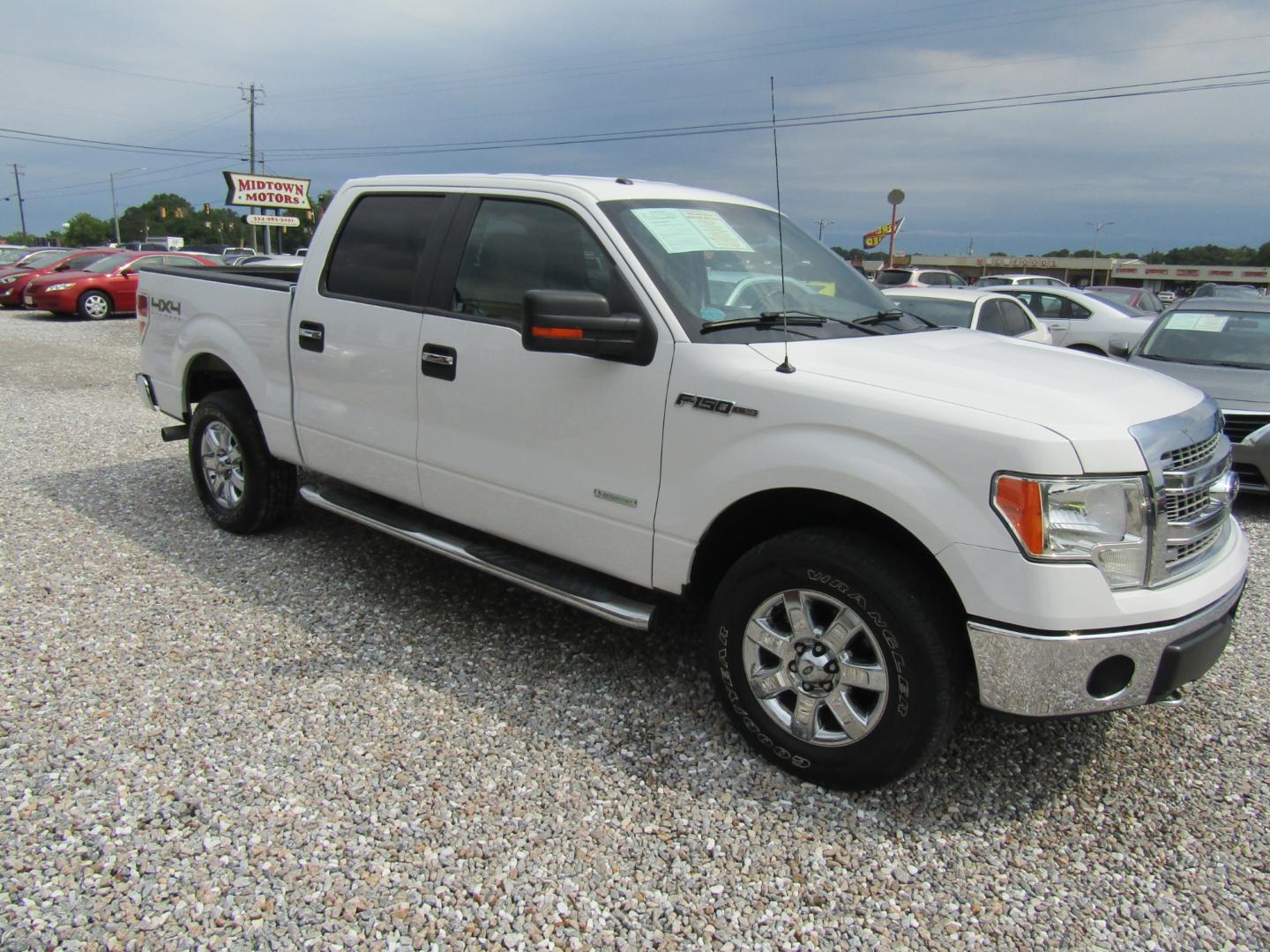 2014 White /Tan Ford F-150 FX4 SuperCrew 5.5-ft. Bed 4WD (1FTFW1ET1EF) with an 3.5L V6 TURBO engine, Automatic transmission, located at 15016 S Hwy 231, Midland City, AL, 36350, (334) 983-3001, 31.306210, -85.495277 - Photo#0